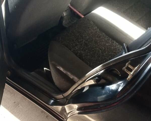 Чорний Деу Ланос, об'ємом двигуна 1.5 л та пробігом 157 тис. км за 1650 $, фото 9 на Automoto.ua