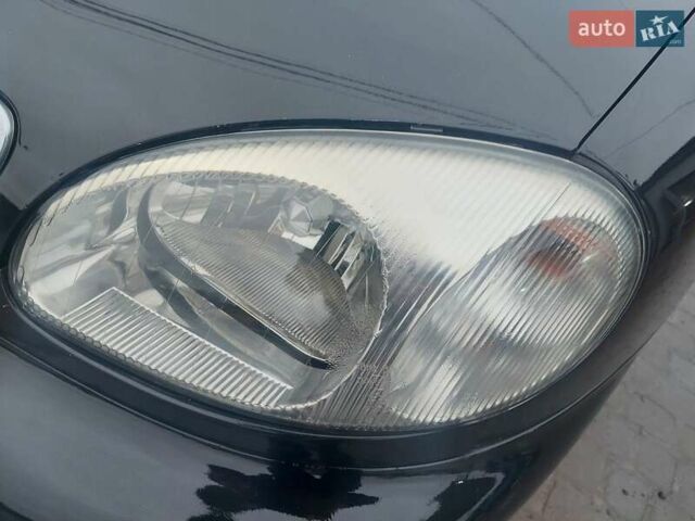 Черный Дэу Ланос, объемом двигателя 1.5 л и пробегом 185 тыс. км за 2100 $, фото 9 на Automoto.ua