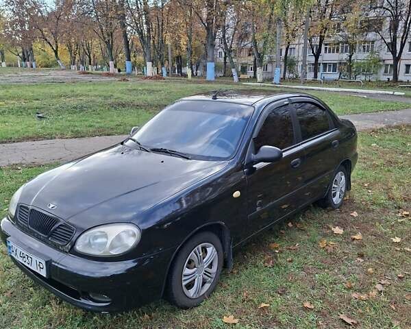 Чорний Деу Ланос, об'ємом двигуна 1.5 л та пробігом 219 тис. км за 1900 $, фото 1 на Automoto.ua
