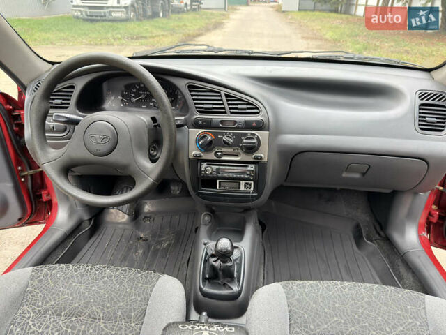 Черный Дэу Ланос, объемом двигателя 1.6 л и пробегом 156 тыс. км за 2400 $, фото 10 на Automoto.ua