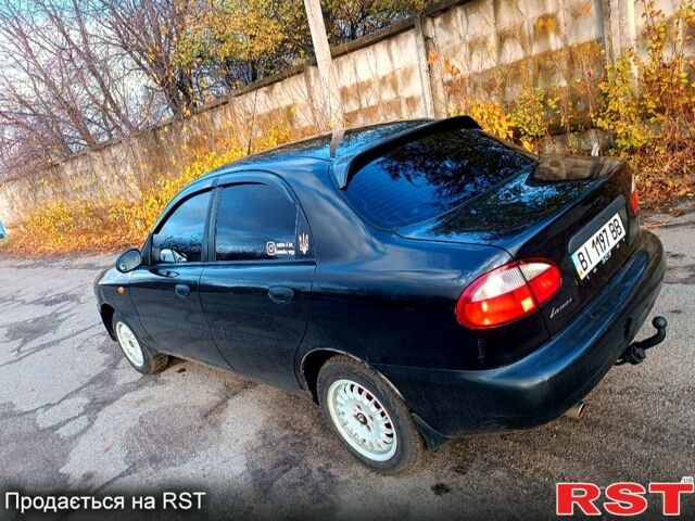 Чорний Деу Ланос, об'ємом двигуна 15 л та пробігом 211 тис. км за 3100 $, фото 6 на Automoto.ua