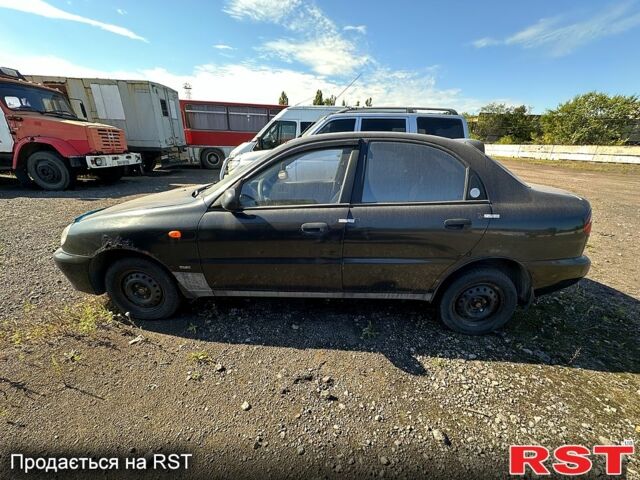 Черный Дэу Ланос, объемом двигателя 1.5 л и пробегом 516 тыс. км за 1770 $, фото 3 на Automoto.ua