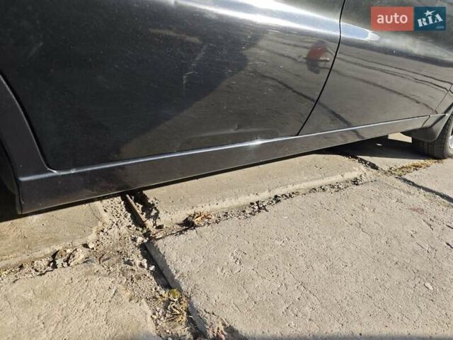 Деу Ланос 2008 у Запоріжжя на Automoto.ua Чорний Деу Ланос, об'ємом двигуна 1.5 л та пробігом 187 тис. км за 2350 $, фото 6 на Automoto.ua