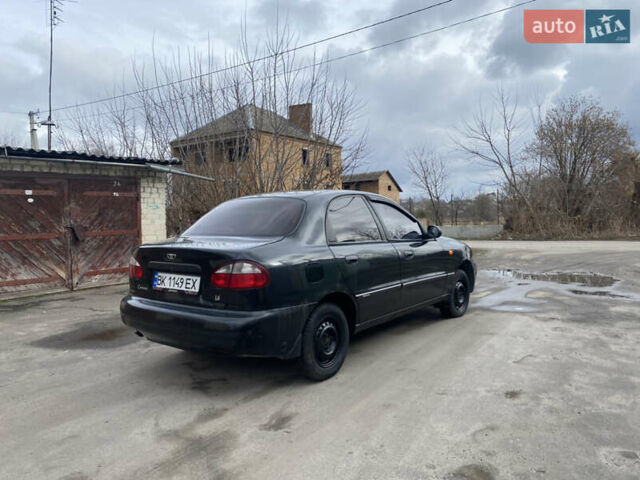 Чорний Деу Ланос, об'ємом двигуна 1.4 л та пробігом 180 тис. км за 1800 $, фото 6 на Automoto.ua