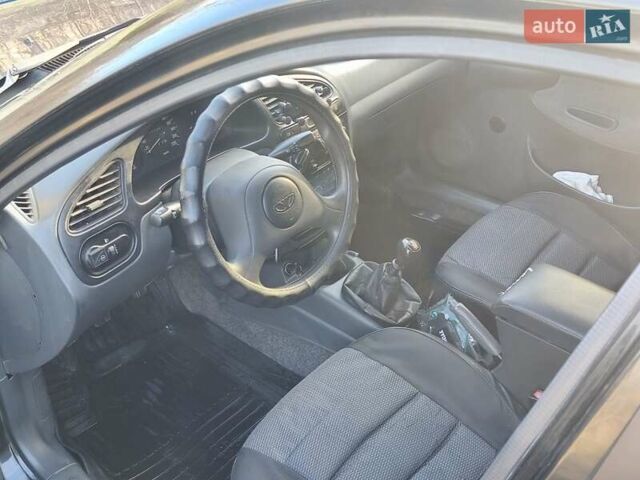 Черный Дэу Ланос, объемом двигателя 1.5 л и пробегом 216 тыс. км за 2699 $, фото 5 на Automoto.ua