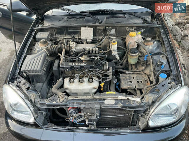 Чорний Деу Ланос, об'ємом двигуна 1.5 л та пробігом 100 тис. км за 3000 $, фото 17 на Automoto.ua