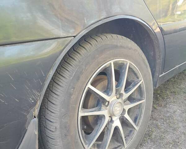 Черный Дэу Ланос, объемом двигателя 1.5 л и пробегом 180 тыс. км за 2250 $, фото 3 на Automoto.ua