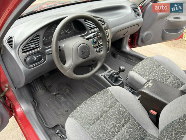 Черный Дэу Ланос, объемом двигателя 1.6 л и пробегом 156 тыс. км за 2400 $, фото 6 на Automoto.ua