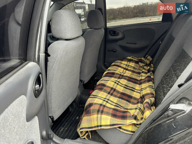 Чорний Деу Ланос, об'ємом двигуна 1.6 л та пробігом 40 тис. км за 3900 $, фото 4 на Automoto.ua