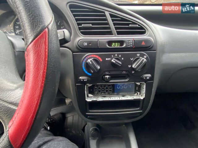 Черный Дэу Ланос, объемом двигателя 1.5 л и пробегом 231 тыс. км за 2900 $, фото 11 на Automoto.ua