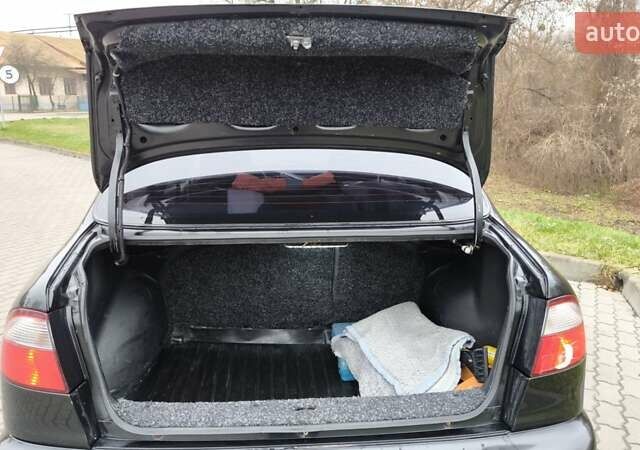 Черный Дэу Ланос, объемом двигателя 1.39 л и пробегом 213 тыс. км за 2300 $, фото 10 на Automoto.ua