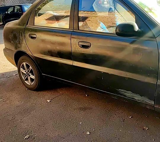 Черный Дэу Ланос, объемом двигателя 1.4 л и пробегом 0 тыс. км за 1300 $, фото 1 на Automoto.ua