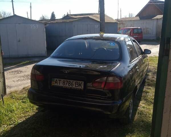 Чорний Деу Ланос, об'ємом двигуна 1.5 л та пробігом 157 тис. км за 1650 $, фото 4 на Automoto.ua