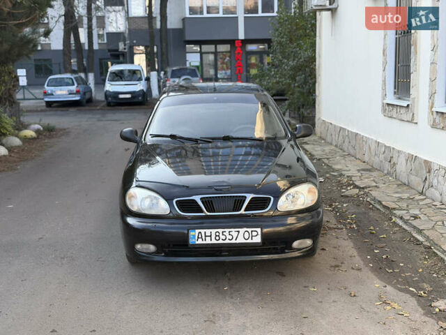 Черный Дэу Ланос, объемом двигателя 1.5 л и пробегом 100 тыс. км за 2900 $, фото 1 на Automoto.ua