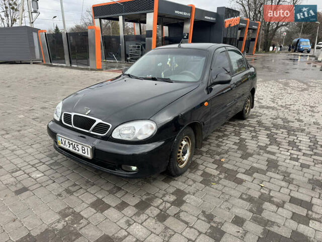 Черный Дэу Ланос, объемом двигателя 1.5 л и пробегом 142 тыс. км за 2799 $, фото 1 на Automoto.ua