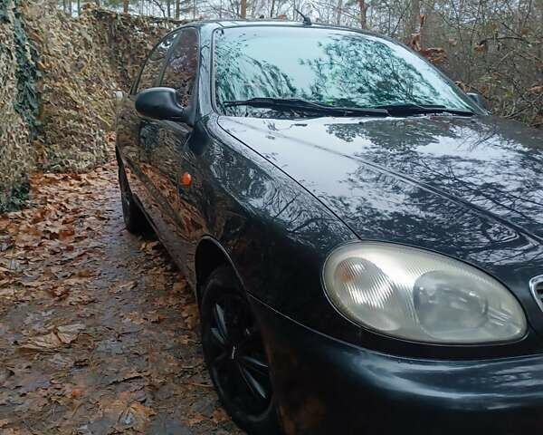 Чорний Деу Ланос, об'ємом двигуна 1.39 л та пробігом 170 тис. км за 2500 $, фото 5 на Automoto.ua