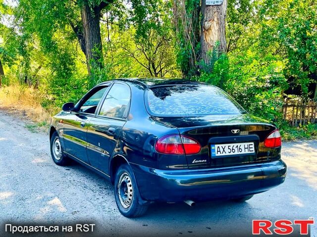 Черный Дэу Ланос, объемом двигателя 1.4 л и пробегом 303 тыс. км за 1199 $, фото 1 на Automoto.ua