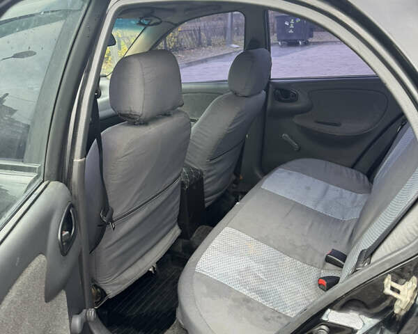 Черный Дэу Ланос, объемом двигателя 1.5 л и пробегом 142 тыс. км за 2799 $, фото 6 на Automoto.ua