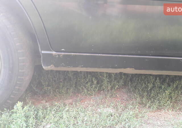 Черный Дэу Ланос, объемом двигателя 1.4 л и пробегом 175 тыс. км за 2500 $, фото 7 на Automoto.ua