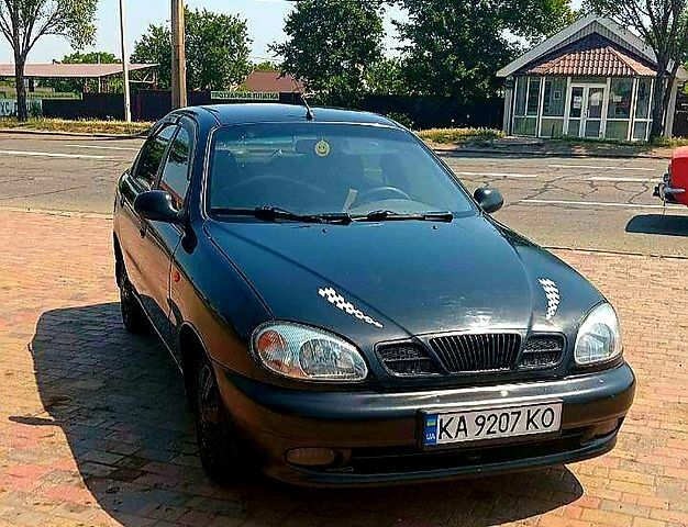 Черный Дэу Ланос, объемом двигателя 1.5 л и пробегом 250 тыс. км за 2800 $, фото 1 на Automoto.ua