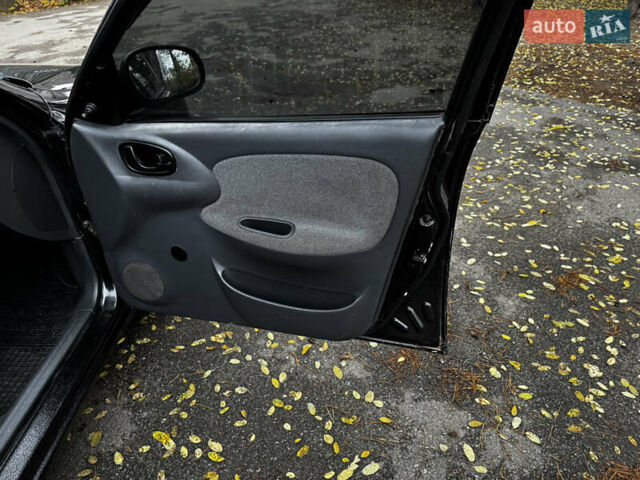 Чорний Деу Ланос, об'ємом двигуна 1.5 л та пробігом 220 тис. км за 2199 $, фото 12 на Automoto.ua