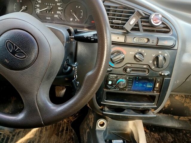 Черный Дэу Ланос, объемом двигателя 1.5 л и пробегом 140 тыс. км за 1100 $, фото 4 на Automoto.ua