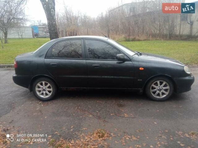 Чорний Деу Ланос, об'ємом двигуна 1.6 л та пробігом 230 тис. км за 1750 $, фото 8 на Automoto.ua