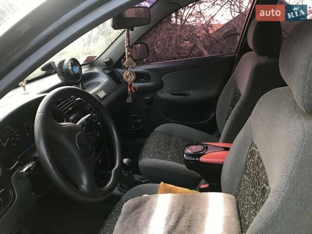 Чорний Деу Ланос, об'ємом двигуна 1.5 л та пробігом 250 тис. км за 3000 $, фото 2 на Automoto.ua