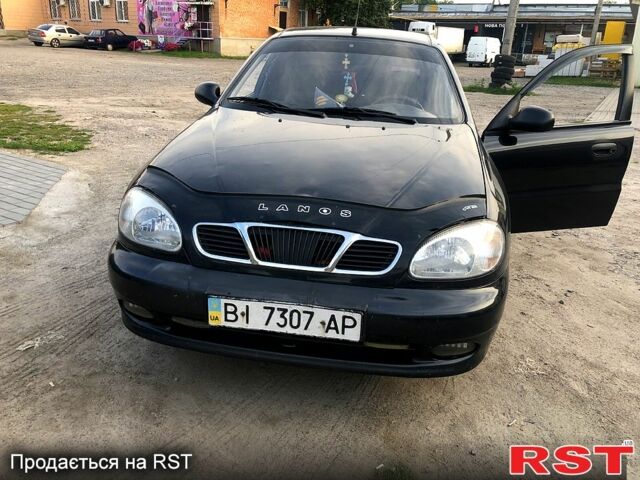 Черный Дэу Ланос, объемом двигателя 1.4 л и пробегом 50 тыс. км за 2250 $, фото 1 на Automoto.ua