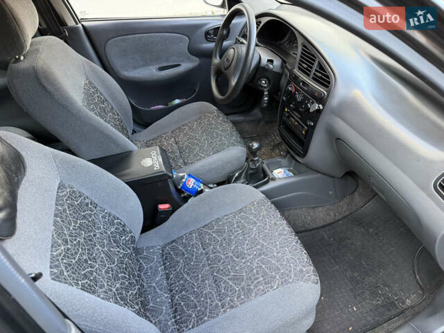 Черный Дэу Ланос, объемом двигателя 1.5 л и пробегом 100 тыс. км за 2900 $, фото 30 на Automoto.ua