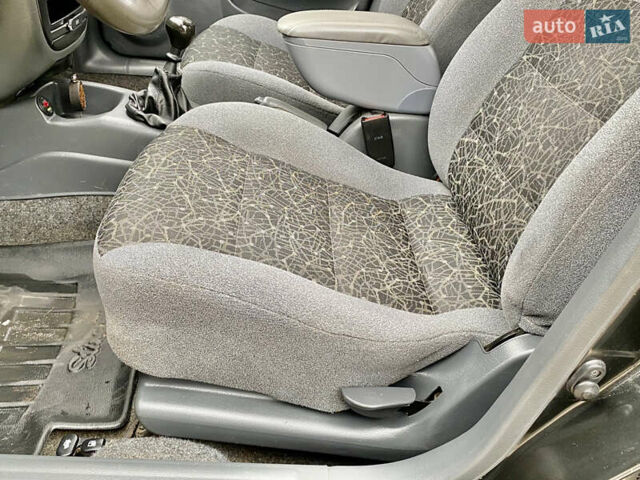 Черный Дэу Ланос, объемом двигателя 1.5 л и пробегом 198 тыс. км за 2600 $, фото 17 на Automoto.ua