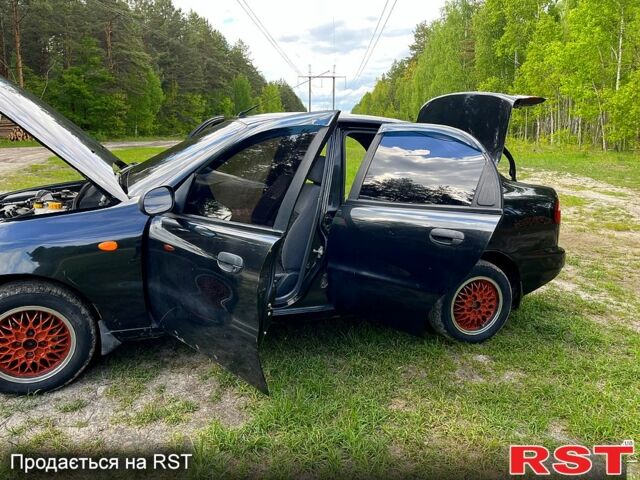 Деу Ланос 2008 у Вышгороде на Automoto.ua Чорний Деу Ланос, об'ємом двигуна 1.5 л та пробігом 210 тис. км за 1900 $, фото 10 на Automoto.ua