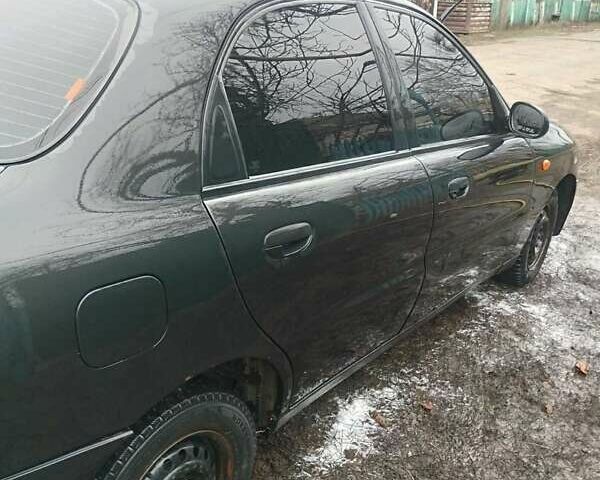 Чорний Деу Ланос, об'ємом двигуна 1.5 л та пробігом 220 тис. км за 2000 $, фото 10 на Automoto.ua