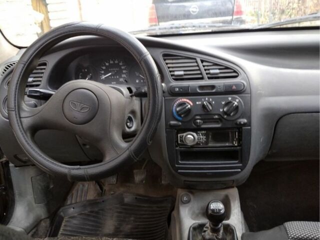 Черный Дэу Ланос, объемом двигателя 1.4 л и пробегом 1 тыс. км за 2000 $, фото 5 на Automoto.ua