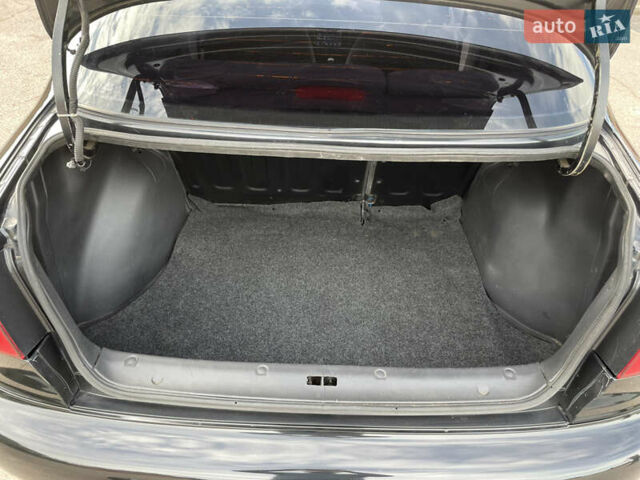 Черный Дэу Ланос, объемом двигателя 1.5 л и пробегом 122 тыс. км за 2950 $, фото 23 на Automoto.ua