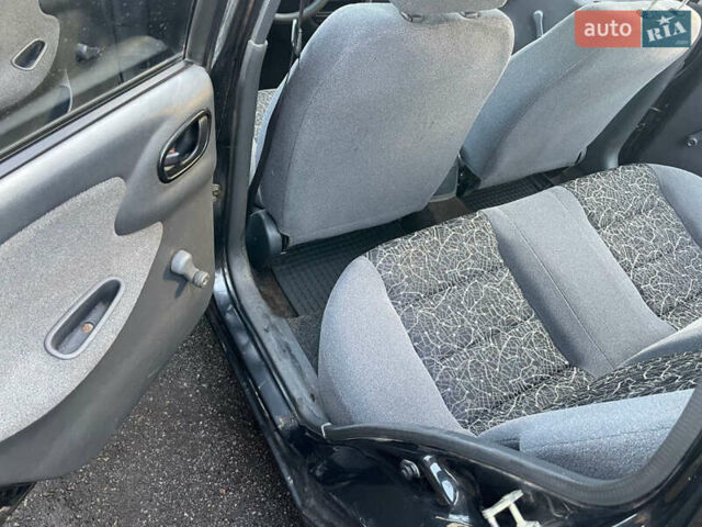 Чорний Деу Ланос, об'ємом двигуна 1.5 л та пробігом 100 тис. км за 3000 $, фото 16 на Automoto.ua