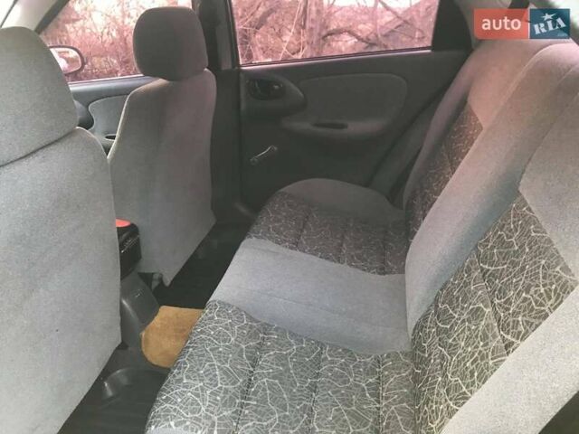 Чорний Деу Ланос, об'ємом двигуна 1.5 л та пробігом 250 тис. км за 3000 $, фото 3 на Automoto.ua