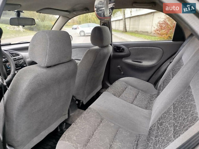 Черный Дэу Ланос, объемом двигателя 1.5 л и пробегом 350 тыс. км за 1800 $, фото 6 на Automoto.ua