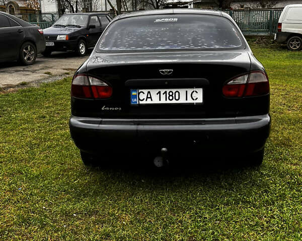 Черный Дэу Ланос, объемом двигателя 1.5 л и пробегом 200 тыс. км за 2000 $, фото 3 на Automoto.ua