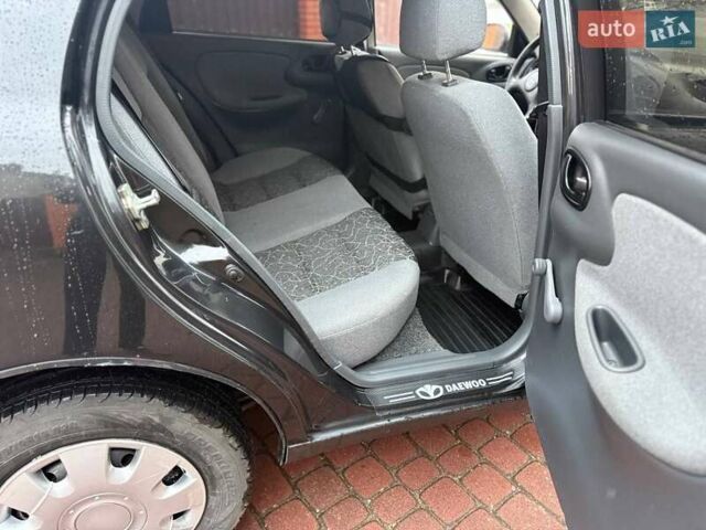 Черный Дэу Ланос, объемом двигателя 1.5 л и пробегом 225 тыс. км за 2999 $, фото 10 на Automoto.ua