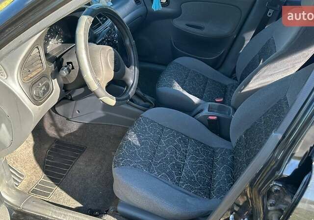 Чорний Деу Ланос, об'ємом двигуна 1.5 л та пробігом 235 тис. км за 2500 $, фото 16 на Automoto.ua