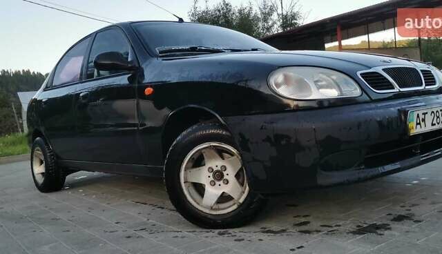 Черный Дэу Ланос, объемом двигателя 1.3 л и пробегом 160 тыс. км за 2000 $, фото 5 на Automoto.ua