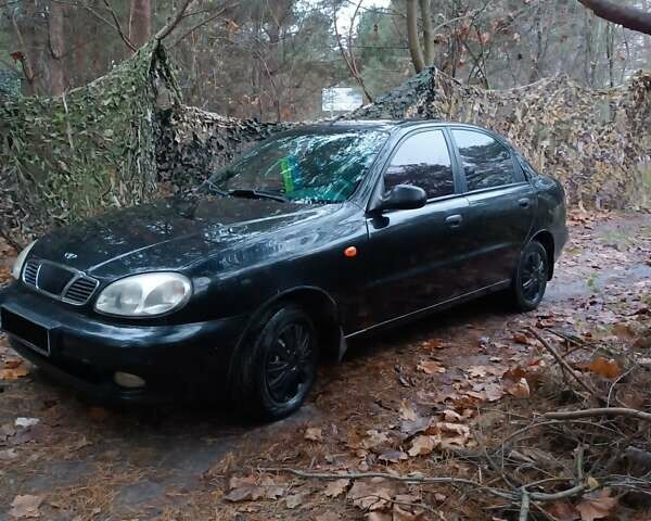 Чорний Деу Ланос, об'ємом двигуна 1.39 л та пробігом 170 тис. км за 2500 $, фото 1 на Automoto.ua