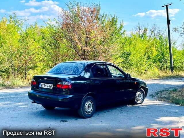 Черный Дэу Ланос, объемом двигателя 1.4 л и пробегом 303 тыс. км за 1199 $, фото 5 на Automoto.ua