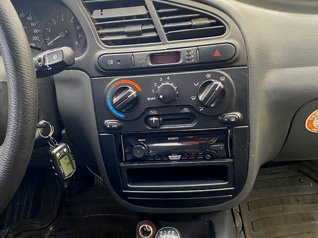 Чорний Деу Ланос, об'ємом двигуна 1.5 л та пробігом 256 тис. км за 1100 $, фото 8 на Automoto.ua