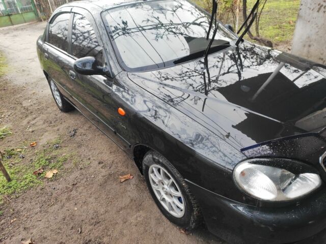 Черный Дэу Ланос, объемом двигателя 1.5 л и пробегом 130 тыс. км за 2700 $, фото 2 на Automoto.ua