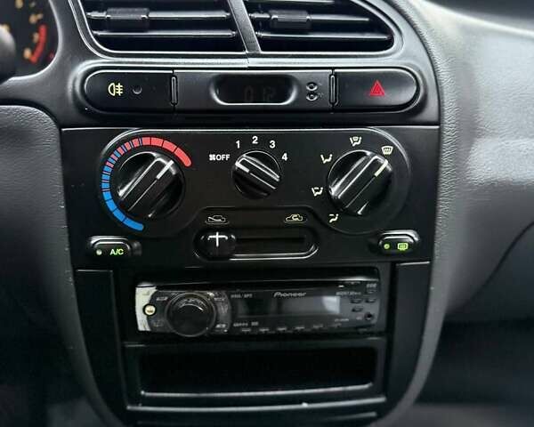 Черный Дэу Ланос, объемом двигателя 1.5 л и пробегом 225 тыс. км за 2999 $, фото 21 на Automoto.ua