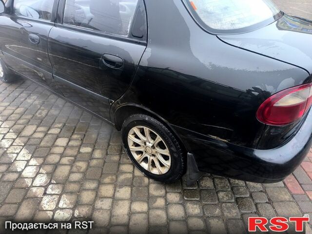 Черный Дэу Ланос, объемом двигателя 1.5 л и пробегом 220 тыс. км за 1000 $, фото 10 на Automoto.ua