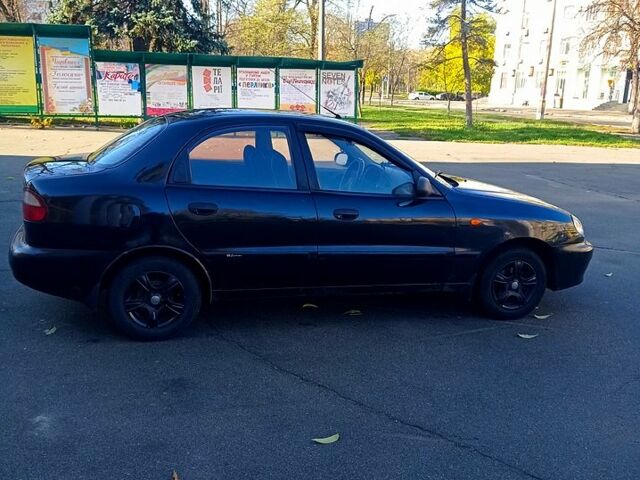 Черный Дэу Ланос, объемом двигателя 1.5 л и пробегом 365 тыс. км за 2000 $, фото 3 на Automoto.ua