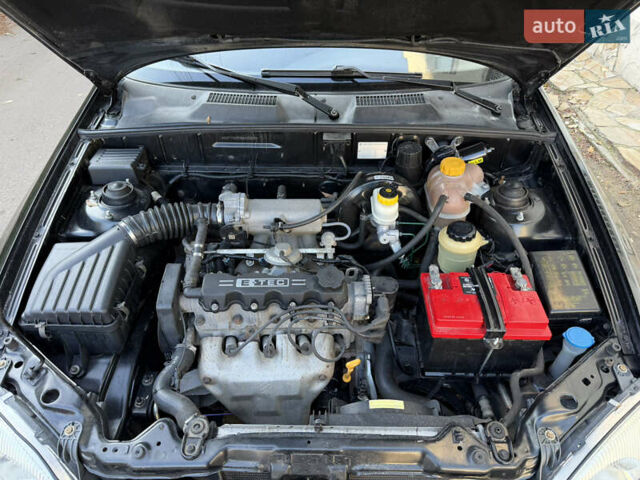 Черный Дэу Ланос, объемом двигателя 1.5 л и пробегом 100 тыс. км за 2900 $, фото 32 на Automoto.ua